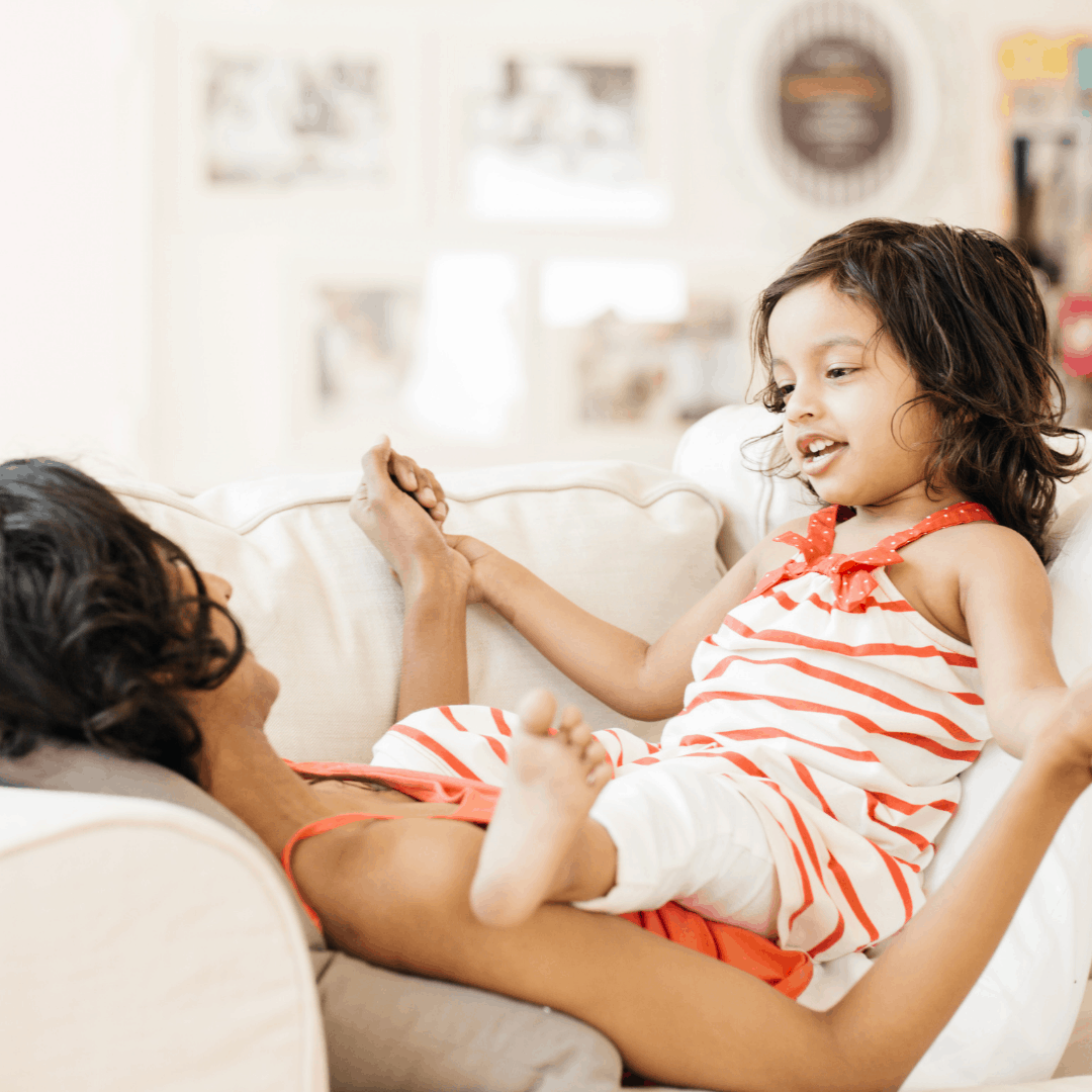 child sitting on her mom