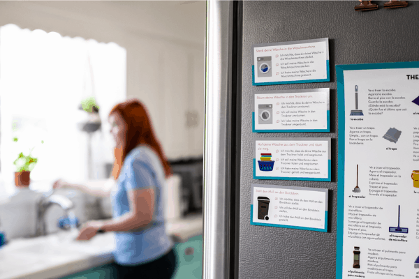 language flashcards on a fridge