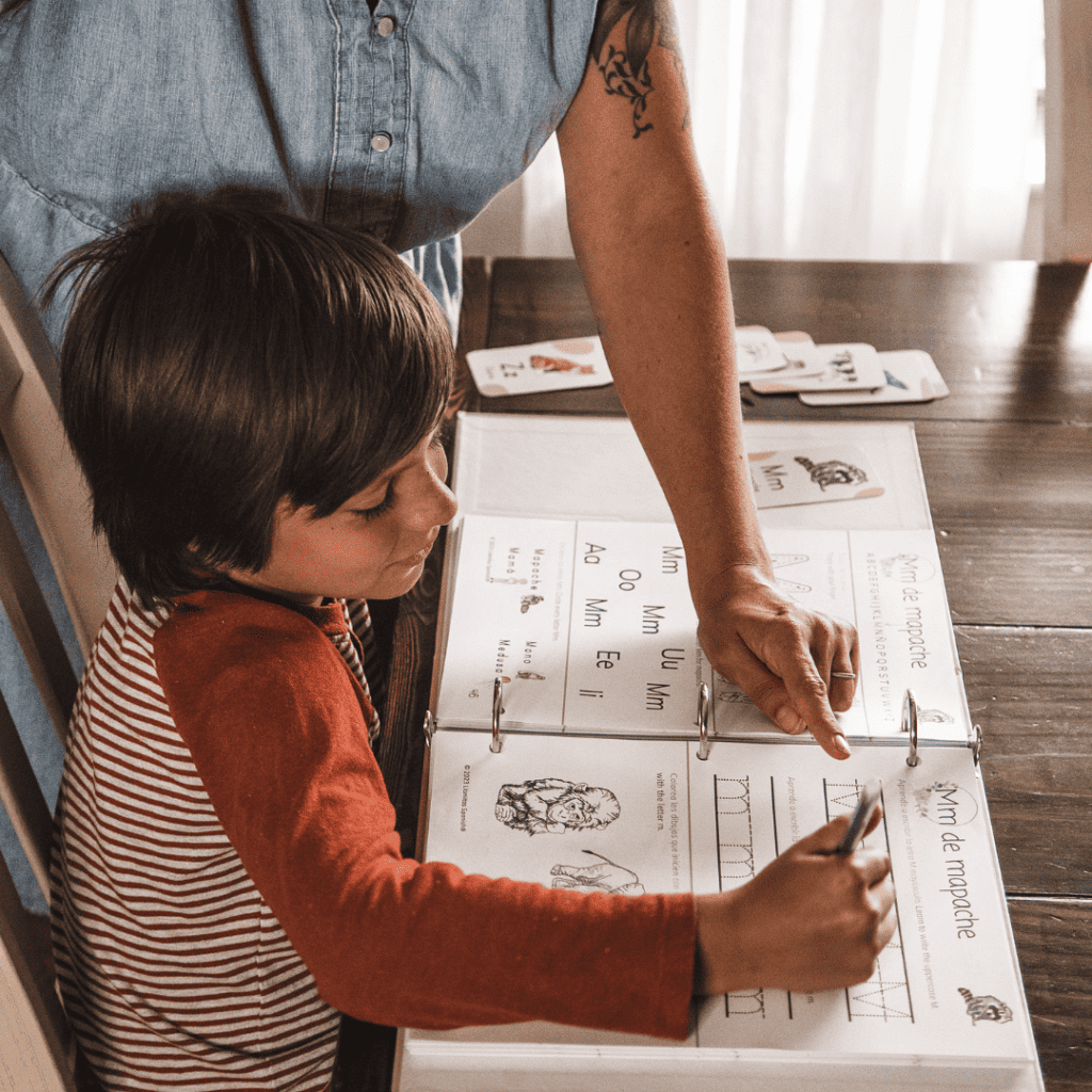 child learning Spanish with worksheets