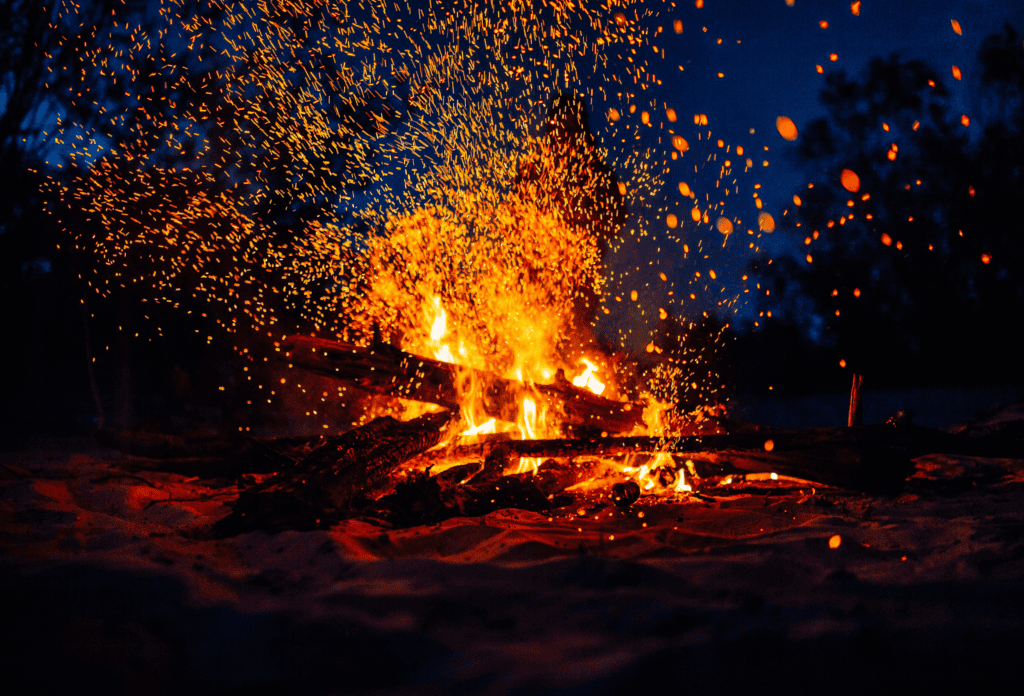 a bonfire with logs