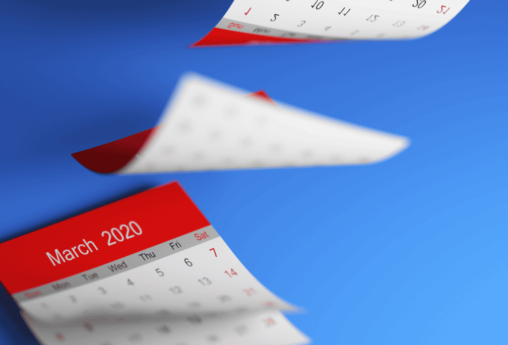 sheets of calendar paper flying through the air