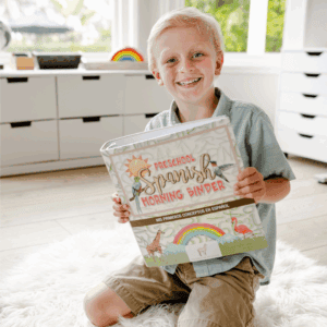 student holding preschool morning binder