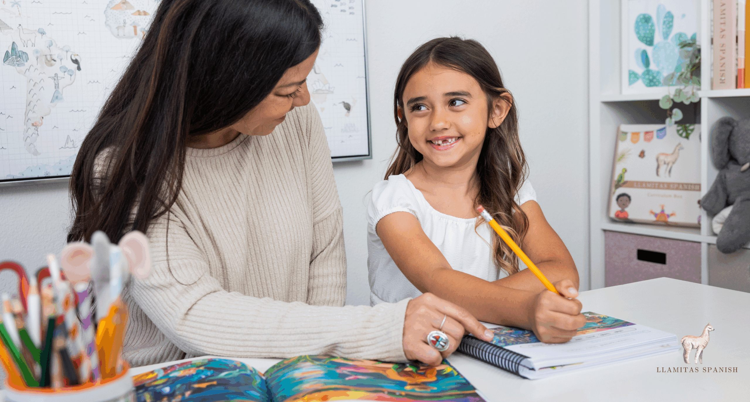 Mother and daughter completing the Llamitas Spanish Level 2 curriculum